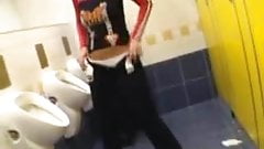 Blonde babe peeing in men’s urinal 1